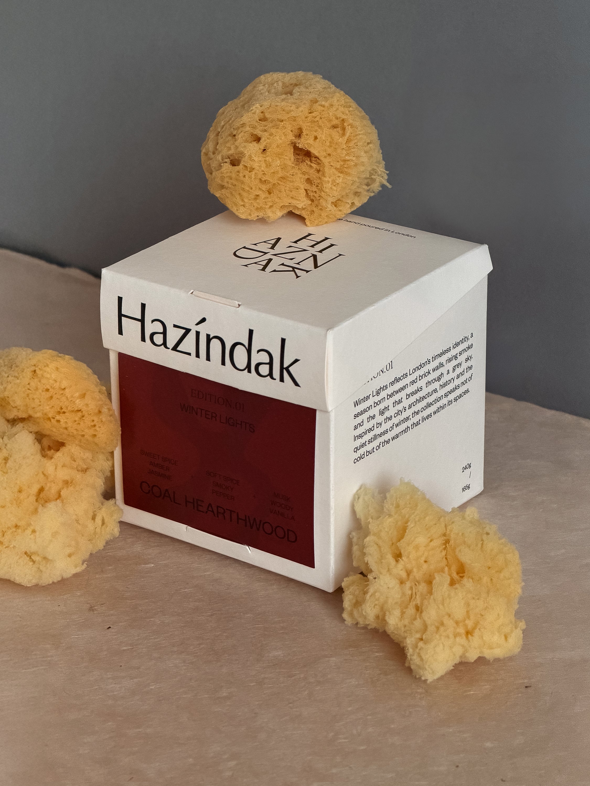 Hazindak premium candle box and unboxing setup, featuring our London-based artisanal packaging.